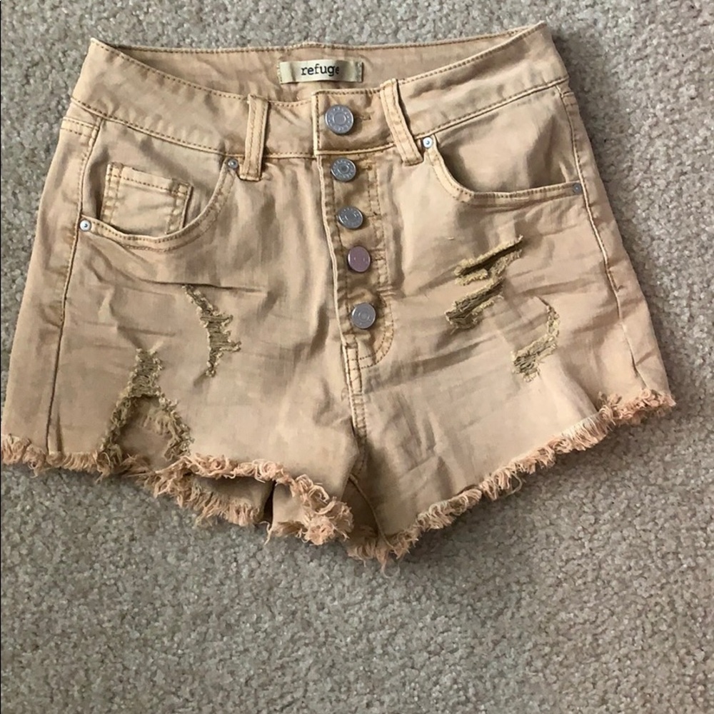 Tan jean shorts with holes